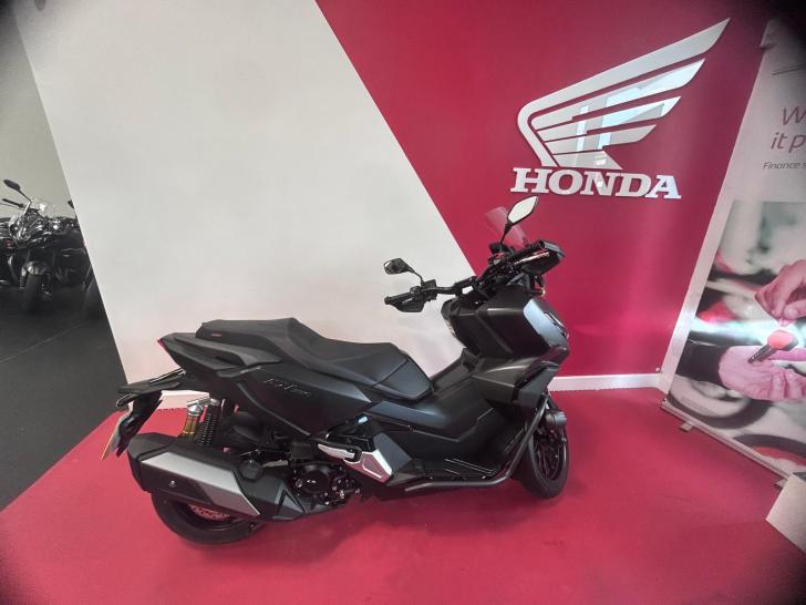 Here's a photo of the HONDA ADV 350, currently available for sale