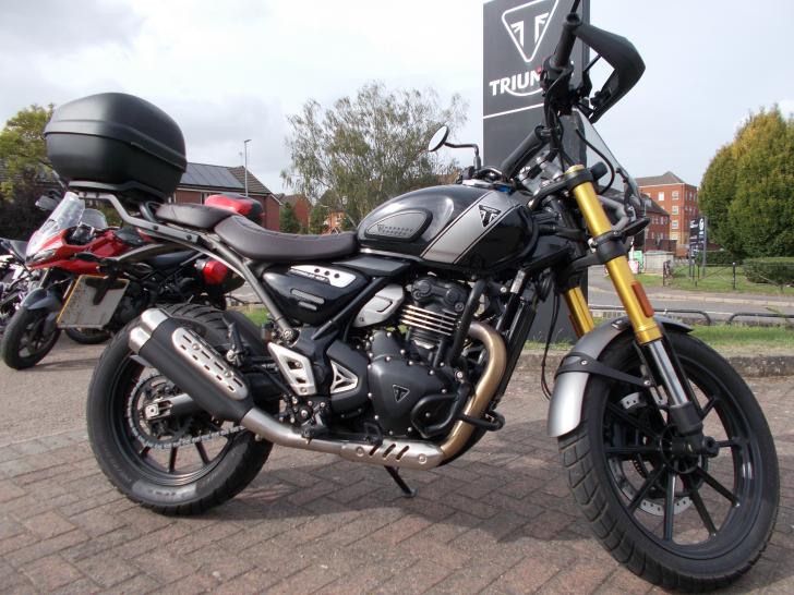 Here's a photo of the TRIUMPH SCRAMBLER 400 X, currently available for sale