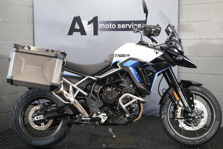 Here's a photo of the TRIUMPH TIGER 900 ALPINE EDITION, currently available for sale