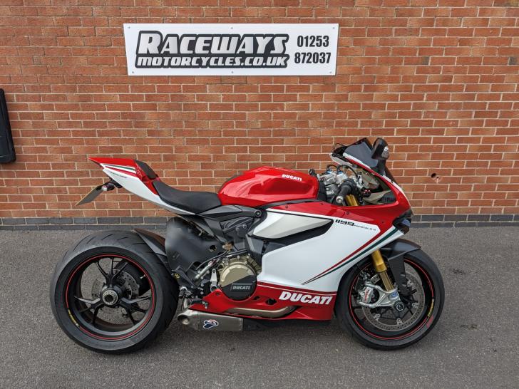 Here's a photo of the DUCATI 1199 PANIGALE TRICOLORE, currently available for sale